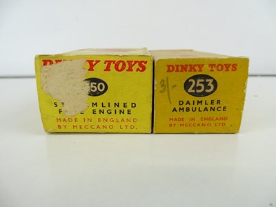 Lot 29 - A pair of DINKY 253 Daimler Ambulances in...