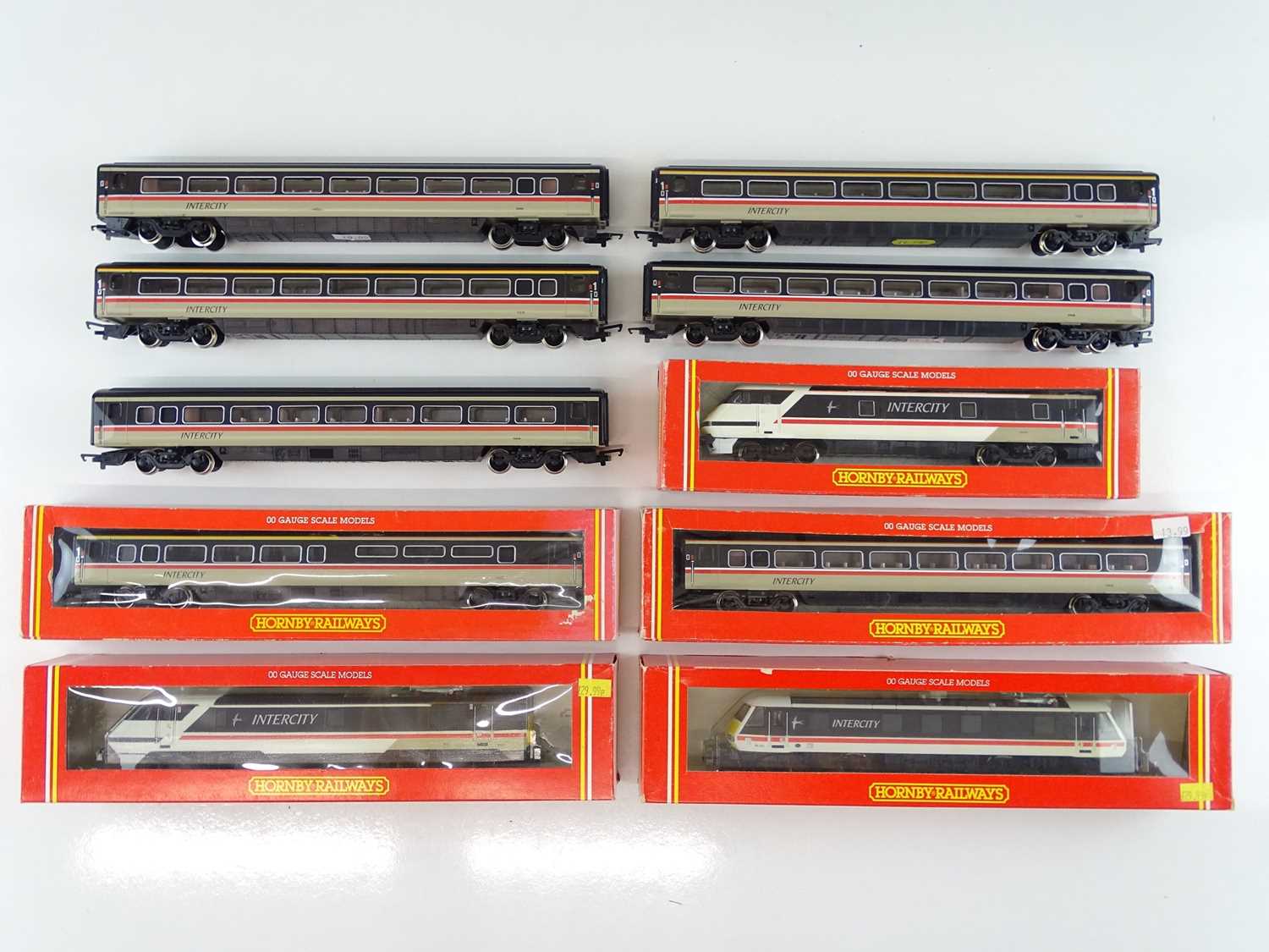 Lot 315 - A group of HORNBY OO Gauge rolling stock,...