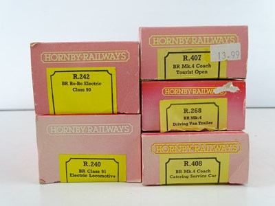 Lot 315 - A group of HORNBY OO Gauge rolling stock,...