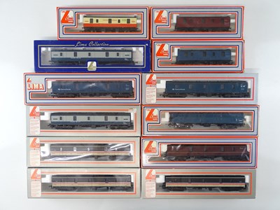 Lot 338 - A large group of LIMA OO Gauge parcels vans in...