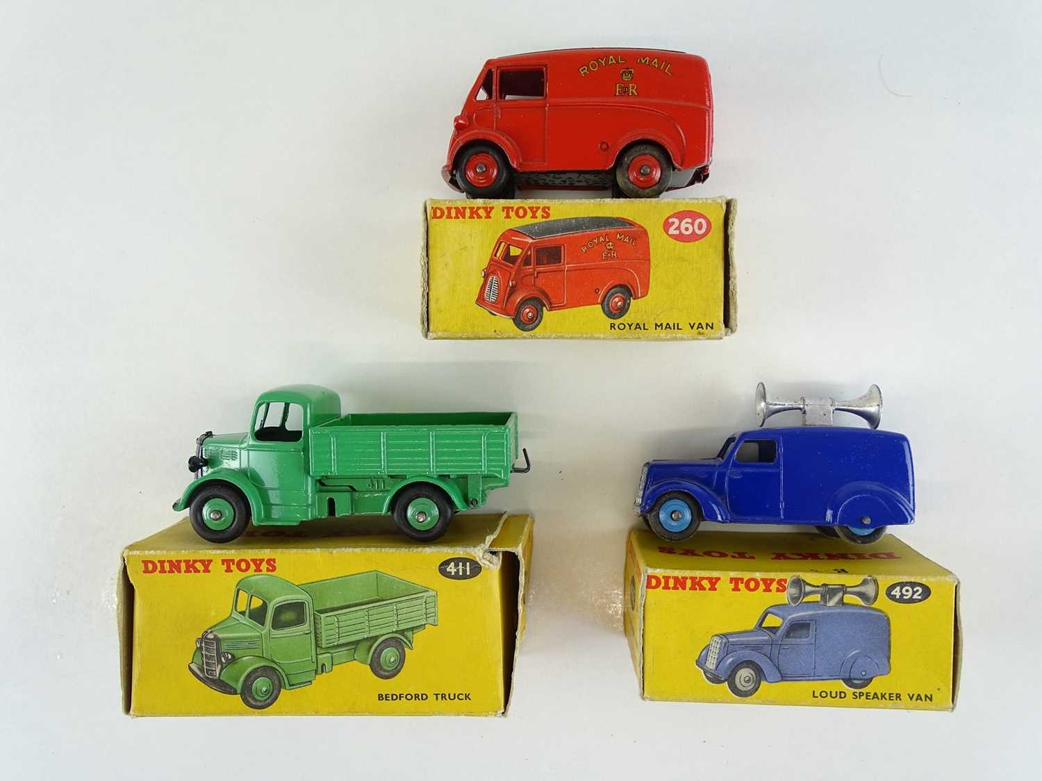 Lot 42 - A group of three DINKY vans comprising 260,...