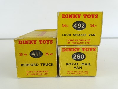 Lot 42 - A group of three DINKY vans comprising 260,...