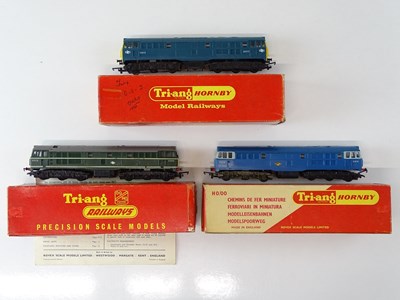 Lot 399 - A group of TRI-ANG OO Gauge Class 31 diesel...