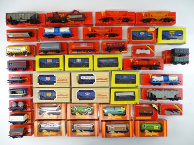 Lot 417 - A large quantity of OO Gauge freight wagons by...