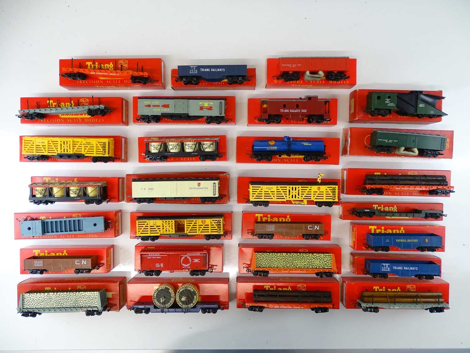 Lot 420 - A large group of TRI-ANG OO Gauge wagons...