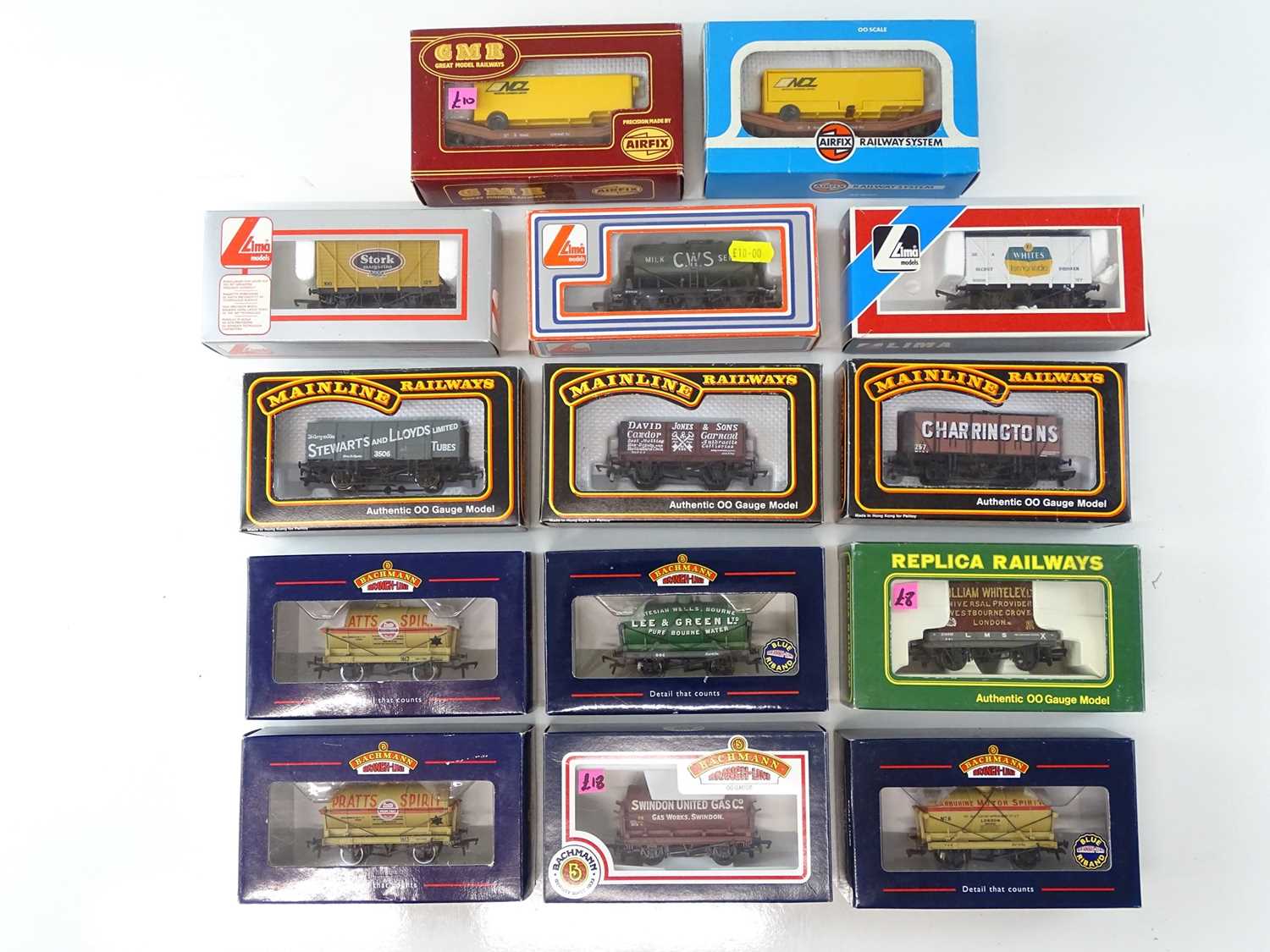 Lot 438 - A mixed group of OO Gauge wagons by BACHMANN,...