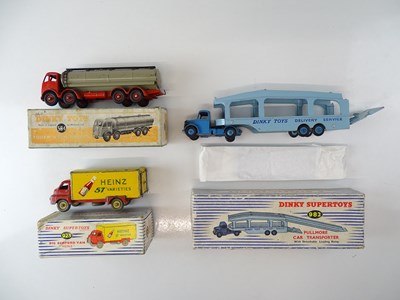 Lot 52 - A group of playworn trucks by DINKY comprising:...