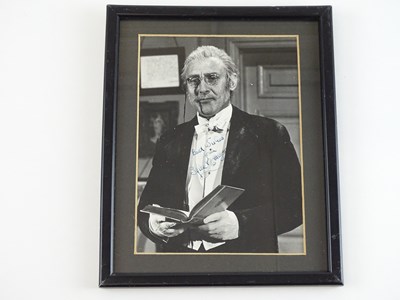 Lot 172 - COMEDY: A framed and glazed black and white...