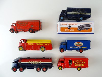 Lot 70 - A group of unboxed DINKY vans and lorries -...