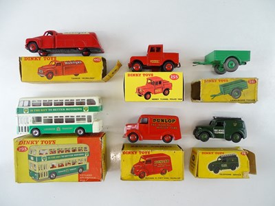 Lot 76 - A group of DINKY Toys vans together with a bus...