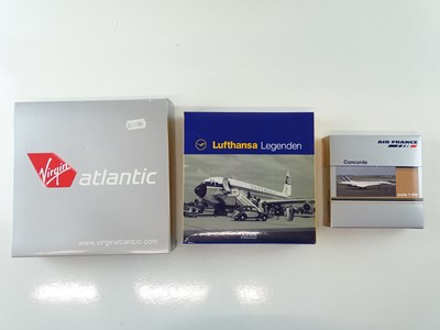 Lot 8 - A mixed group of diecast airplanes in various...