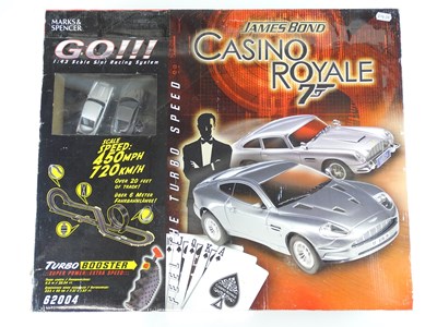 Lot 94 - A pair of James Bond Movie Tie-In Slot Racing...