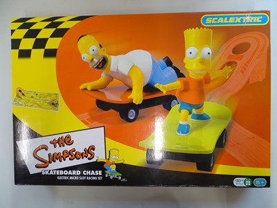 Lot 99 - A MICRO SCALEXTRIC The Simpsons Skateboard...
